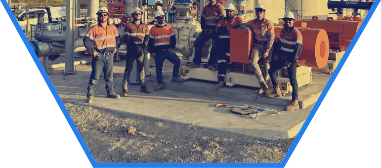 Vex group team standing in front of a completed project hex bot
